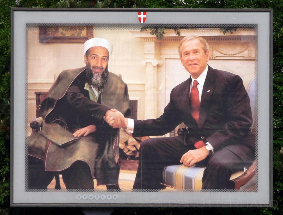 Bush und Bin Laden auf einem Plakat shaking hands